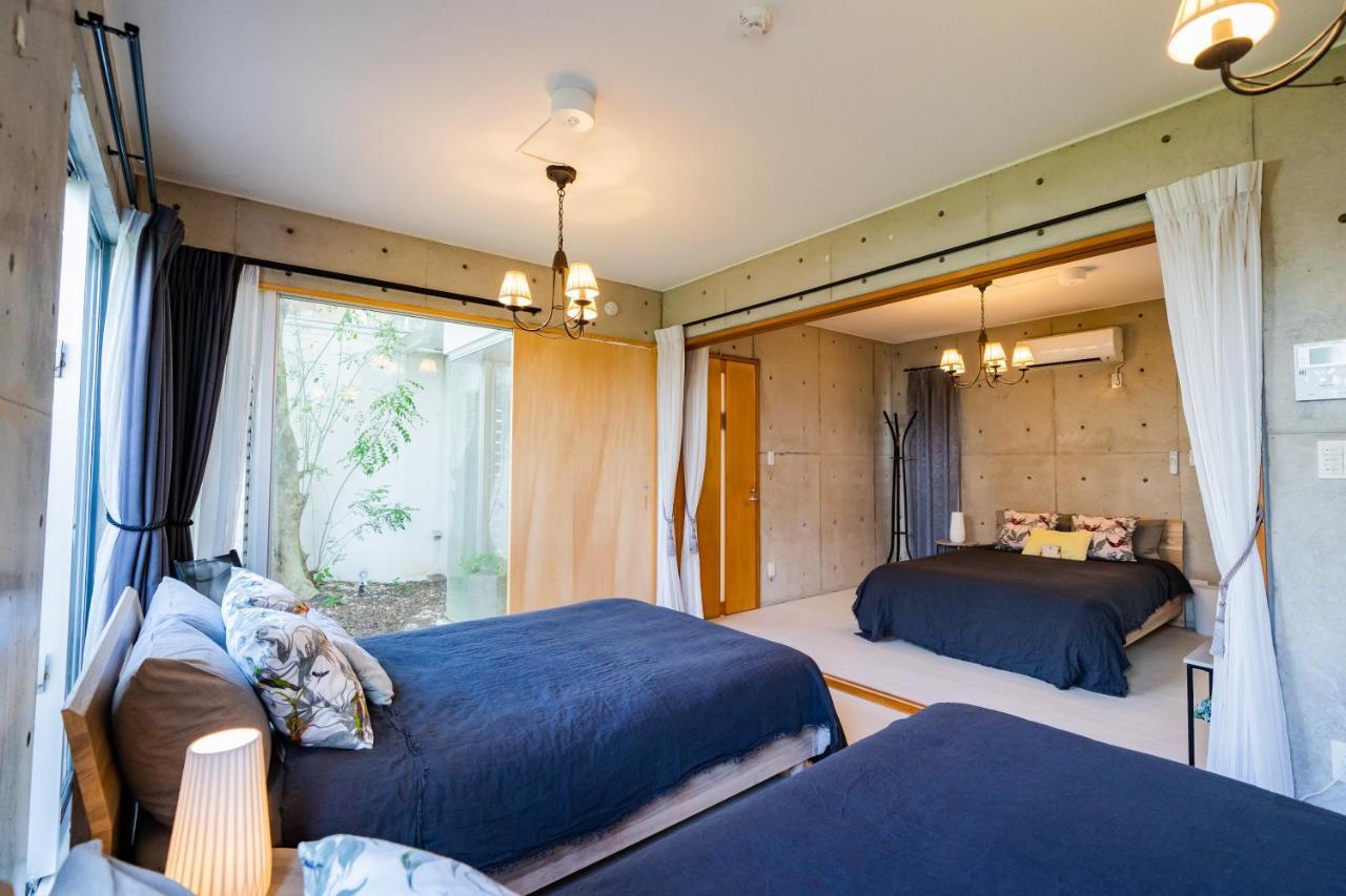 Em Tree House Villa Uruma Eksteriør billede